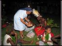 Sr. Mary Jeanette - Sharing food with village people.JPG